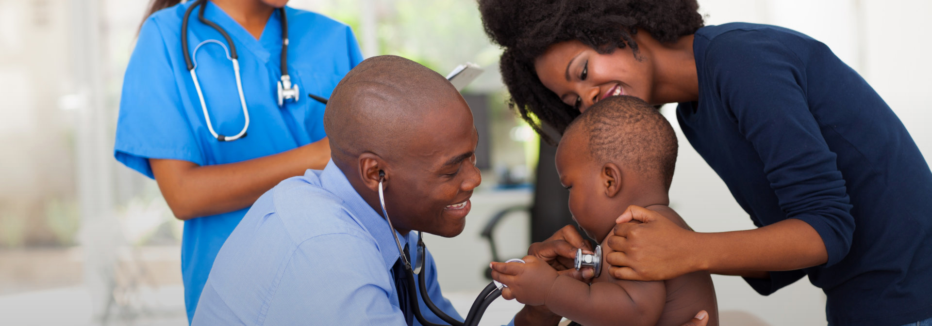 children and young woman in playground